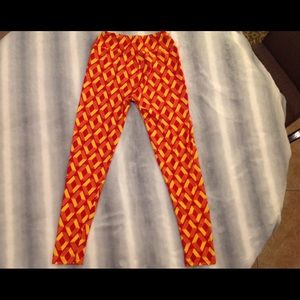 LULAROE red & yellow leggings one size fits all
